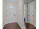 Welcoming foyer with hardwood floors and a view into other areas of the home at 840 Pecan Tree Ln, Fort Mill, SC 29715