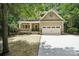 Charming craftsman-style home with a two-car garage and inviting front porch at 8521 Aspen Ct, Charlotte, NC 28227