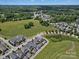 Aerial view of the neighborhood with lush greenery and community amenities, showcasing a desirable setting at 909 Herrons Ferry Rd, Rock Hill, SC 29730