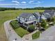 This aerial view features the home and the surrounding neighborhood, close to community green space at 909 Herrons Ferry Rd, Rock Hill, SC 29730