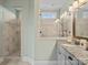 Elegant bathroom featuring granite countertop and glass enclosed tile shower with dual shower heads at 909 Herrons Ferry Rd, Rock Hill, SC 29730