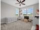 Bright bedroom with 2 large windows with playroom with toys and gray carpet flooring at 909 Herrons Ferry Rd, Rock Hill, SC 29730