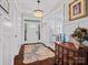 Bright foyer with chandelier, decorative rug, and stylish wainscoting at 909 Herrons Ferry Rd, Rock Hill, SC 29730