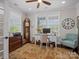 Bright office with large windows, hardwood floors, and classic furnishings, including a grandfather clock at 909 Herrons Ferry Rd, Rock Hill, SC 29730