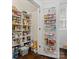 Well-organized pantry with adjustable shelving and door-mounted spice racks for maximum storage and convenience at 909 Herrons Ferry Rd, Rock Hill, SC 29730