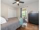 Cozy bedroom with hardwood floors, closet, and natural light from window at 9300 Surrey Rd, Mint Hill, NC 28227