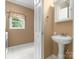 Bright bathroom showcasing a pedestal sink and well-lit vanity with ample space at 1010 Arabian Farm Rd, Clover, SC 29710