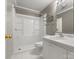 Clean bathroom with shower and tub combo and a large, modern mirror at 1010 Arabian Farm Rd, Clover, SC 29710
