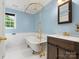 Charming bathroom features a clawfoot tub with elegant fixtures and natural light at 1010 Arabian Farm Rd, Clover, SC 29710