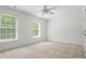 Bright bedroom with two windows providing plenty of natural light and scenic views at 1010 Arabian Farm Rd, Clover, SC 29710