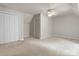 Bedroom showcasing a ceiling fan, built-in closet, and neutral carpet at 1010 Arabian Farm Rd, Clover, SC 29710