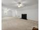 Large bonus room with neutral carpet and fireplace at 1010 Arabian Farm Rd, Clover, SC 29710