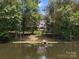 Beautiful house overlooking the serene pond and featuring a private dock at 1010 Arabian Farm Rd, Clover, SC 29710
