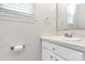 Bathroom featuring a well-maintained sink and vanity, showcasing clean and functional design at 10945 Wiltshire Ln, Charlotte, NC 28262