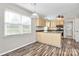 Bright kitchen with a window, spacious layout, and seamless access to the dining area at 10945 Wiltshire Ln, Charlotte, NC 28262