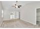 Bright main bedroom with ensuite bathroom access and walk-in closet, offering convenience and privacy at 10945 Wiltshire Ln, Charlotte, NC 28262