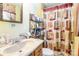 Cozy bathroom featuring a vanity, mirror, and patterned shower curtain at 1104 Colony Ct, Gastonia, NC 28056