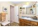 Classic bathroom with vanity, patterned flooring, and decorative accents throughout the space at 1104 Colony Ct, Gastonia, NC 28056
