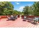 Outdoor deck complete with patio furniture and lush greenery, creating a perfect retreat at 1104 Colony Ct, Gastonia, NC 28056