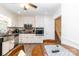 Updated kitchen featuring stainless steel appliances, granite countertops and white cabinetry at 1104 Colony Ct, Gastonia, NC 28056