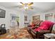 Open living room features hardwood floors and comfortable furniture with a kitchen view at 1109 S Highland Ave, Landis, NC 28088