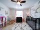 Bedroom with a crib and rocking chair at 1109 Woodwinds Dr, Waxhaw, NC 28173
