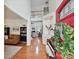 Bright foyer with hardwood floors, piano, and an open view into the living room; a welcoming entrance at 1109 Woodwinds Dr, Waxhaw, NC 28173