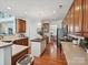 Modern kitchen with wooden cabinets, a central island, stainless steel appliances, and great lighting at 1109 Woodwinds Dr, Waxhaw, NC 28173