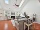 Bright living room features vaulted ceilings, fireplace, skylights, hardwood floors, and neutral decor at 1109 Woodwinds Dr, Waxhaw, NC 28173