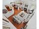 Open-concept living space with kitchen, dining, and living areas with a fireplace at 1109 Woodwinds Dr, Waxhaw, NC 28173