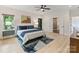 Calm bedroom featuring a queen bed, natural light, and ensuite bathroom at 112 Manning Dr, Charlotte, NC 28209