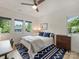 Cozy bedroom with stylish decor, ample natural light, and comfortable furnishings for a restful retreat at 112 Manning Dr, Charlotte, NC 28209