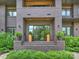 Inviting front entrance with double doors, planters, and brick steps at 112 Manning Dr, Charlotte, NC 28209