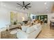 Open concept living room with modern furnishings and hardwood floors at 112 Manning Dr, Charlotte, NC 28209