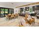 Elegant living and dining space with open kitchen concept and ample natural light at 112 Manning Dr, Charlotte, NC 28209