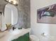 Powder room featuring green vanity with designer faucet at 112 Manning Dr, Charlotte, NC 28209