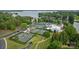 Aerial view of community featuring tennis courts, swimming pool, and clubhouse, offering recreational amenities at 118 Tuscany Trl, Mooresville, NC 28117