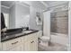 Bathroom with modern sink and vanity combo plus tub-shower with neutral tile and calming neutral paint at 118 Tuscany Trl, Mooresville, NC 28117