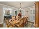 Formal dining room featuring an ornate table setting and sophisticated decor at 118 Tuscany Trl, Mooresville, NC 28117