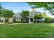 Attractive two-story home with manicured lawn and mature trees at 118 Tuscany Trl, Mooresville, NC 28117