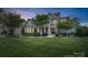 Charming two-story home with a well-manicured lawn and beautiful landscaping at 118 Tuscany Trl, Mooresville, NC 28117