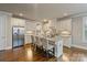 Well-equipped kitchen with granite counters, stainless steel appliances, and breakfast bar at 118 Tuscany Trl, Mooresville, NC 28117