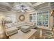 Spacious living room featuring a coffered ceiling and large windows at 118 Tuscany Trl, Mooresville, NC 28117