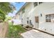 Backyard includes a small patio, green grass, and a white fence at 121 Quality Dr, Mount Holly, NC 28120
