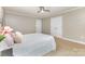 Bedroom featuring two large closets and plush carpets at 121 Quality Dr, Mount Holly, NC 28120