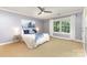 Cozy bedroom with plush carpets and a window, creating a relaxing retreat at 121 Quality Dr, Mount Holly, NC 28120