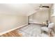 Bedroom features hardwood floors, a ceiling fan and an area rug at 121 Quality Dr, Mount Holly, NC 28120