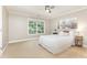 Comfortable bedroom filled with natural light and large window offering scenic views at 121 Quality Dr, Mount Holly, NC 28120