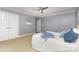 Bright bedroom featuring wall-to-wall carpet with neutral-colored walls at 121 Quality Dr, Mount Holly, NC 28120