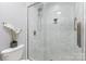 Beautiful tiled walk-in shower with glass door and modern fixtures at 121 Quality Dr, Mount Holly, NC 28120